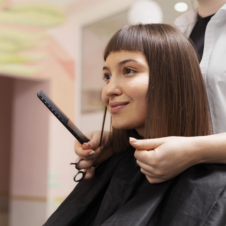 woman-getting-treatment-hairdresser-shop